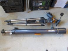 A Celestron Astro Master 90 telescope with stand.