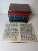 A collection of 20th century World Stamps in seven albums includes Ceylon and Rhodesia.