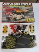 Scalextric Grand Prix track and two raci