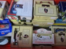 A large collection of Lledo Days Gone By vehicles inc Coca-Cola, Weetabix, Kleenex, Beano, etc,