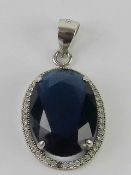 A blue stone pendant stamped 925, 2.8cm