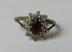 A 9ct gold floral cluster ring, hallmarked 375, size I, 1.