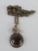 An unusual handmade purple and bronze ha