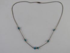 A Native American style turquoise and be