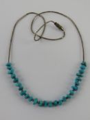 A Native American style turquoise beaded