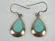 A pair of silver and turquoise earrings,