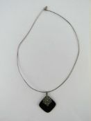 An Art Deco style silver and marcasite p