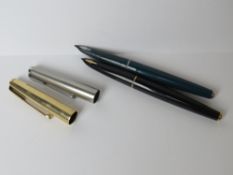 Two Parker fountain pens having conceale