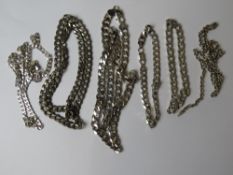 A quantity of silver and white metal heavy chains, some hallmarked some unmarked or stamped 925.