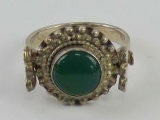 A silver and green onyx ring in the Indo
