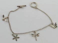 A silver charm bracelet having flower, d