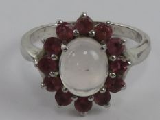 A contemporary silver pink floral cluste