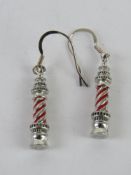 A pair of enamelled earrings in the form