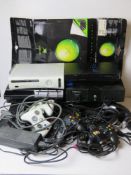 A quantity of retro video game consoles and equipment inc PS3, PS2, XBox, controllers, headphones,