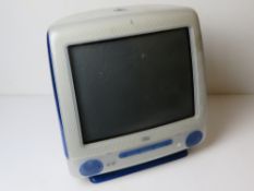 A blue retro Apple iMac. Untested.