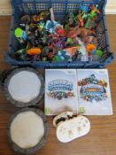 Two Wii Skylanders games together with a quantity of Skylanders figures, stands and Wii controller.