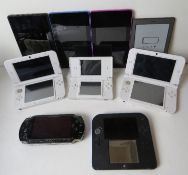 A quantity of hand held games consoles and Kindle tablets including; Nintendo 3DS XL, no stylus,