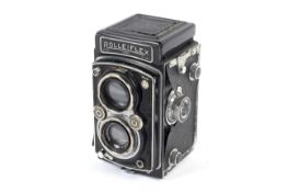 A Rolleiflex Automat DRP 1008925 DRGM 6x6 medium format TLR camera. With Carl Zeiss Jena 75mm 1:3.