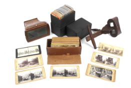 A late 19th/early 20th century burr walnut Stereoscopic viewer with slides and 'the Perfecscope'.
