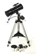 A Helios astronomical telescope and tripod, together with various accessories.
