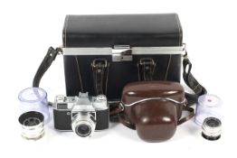 A Kodak Retina Reflex S 35mm camera outfit within fitted case. To include a 50mm 1:2.