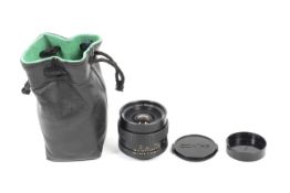 A Carl Zeiss Distagon 2.8 35mm camera lens.