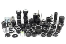 A large collection of camera lens extension tubes, adaptors, bellows and copiers.