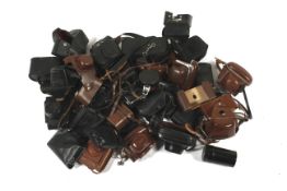 A collection of camera and lens cases.