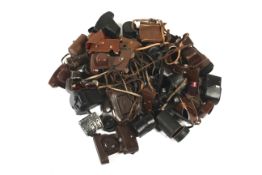 A collection of camera and lens cases.