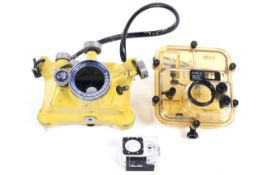 Three underwater camera cases.