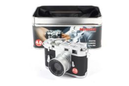 A Minox miniature digital camera modelled on a Leica M3. With a Minoctar 9.