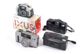 Four Canon 35mm Point and Shoot cameras.