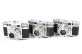 Three Paxette 35mm rangefinder cameras. Two with 45mm 1:2.