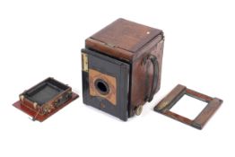 A mahogany large format plate camera body and parts