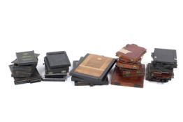 A collection of photographic plate holders.