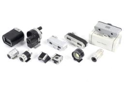 A group of shoe mount viewfinders, rangefinders and attachments.