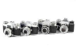 Four Zeiss Ikon Contaflex 35mm cameras. Three with 50mm 1:2.
