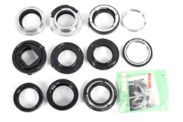 A collection of camera lens adaptors.