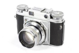 A Voigtlander Prominent 35mm rangefinder camera. With 50mm 1:1.