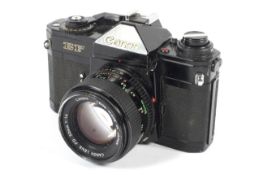 A Canon EF 35mm SLR camera with a 50mm 1:1.4 lens.
