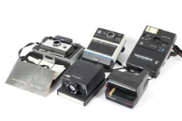 Five instant cameras.