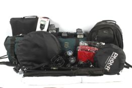 Various accessories including flashes, triggers, bags, reflectors.