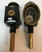 A pair of brass and black lacquered coac