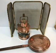 A copper and brass ship's lamp bearing l