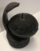 A 19th Century money box in the form of