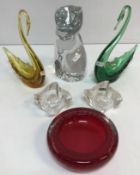 A Daum clear glass figure of a seated ca