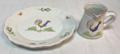 A Quimper pottery plate and jug, Thai st