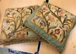 Two scatter cushions with floral woolwork panels