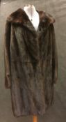 One full length fox fur coat,