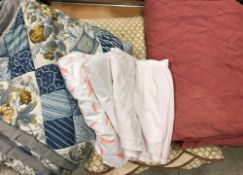 A collection of three bed throws includi